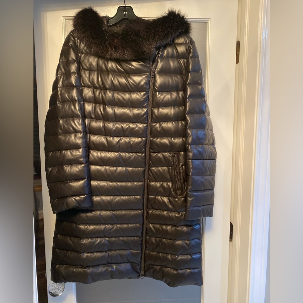 Fox fur, 100%leather, 90% duck feathers,